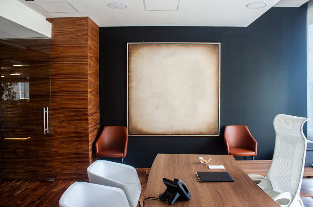 North Van office with wood grain and medium blue walls